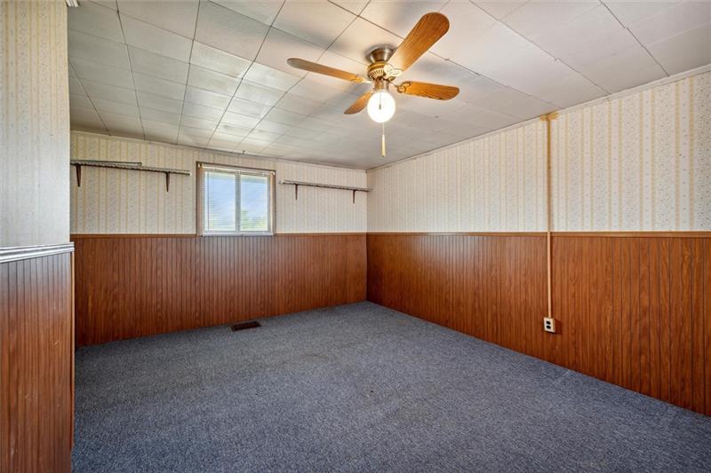 789 Mahoning Road Templeton, PA 16259 - Photo 35 of 41 an empty room with a ceiling fan and entryway