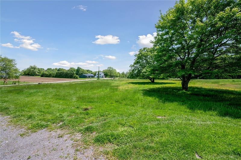 789 Mahoning Road Templeton, PA 16259 - Photo 39 of 41 a view of a golf course with a lake
