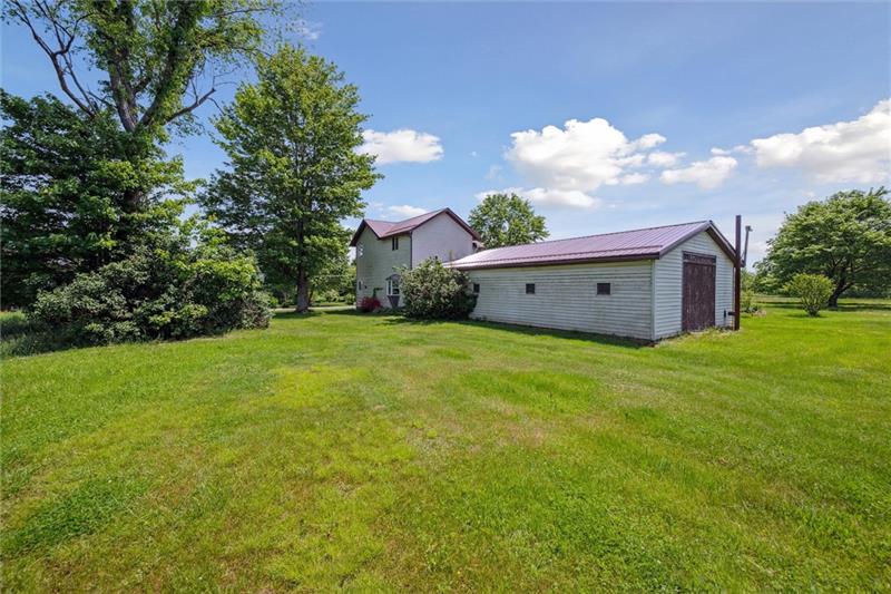 789 Mahoning Road Templeton, PA 16259 - Photo 4 of 41 a view of a backyard with garden