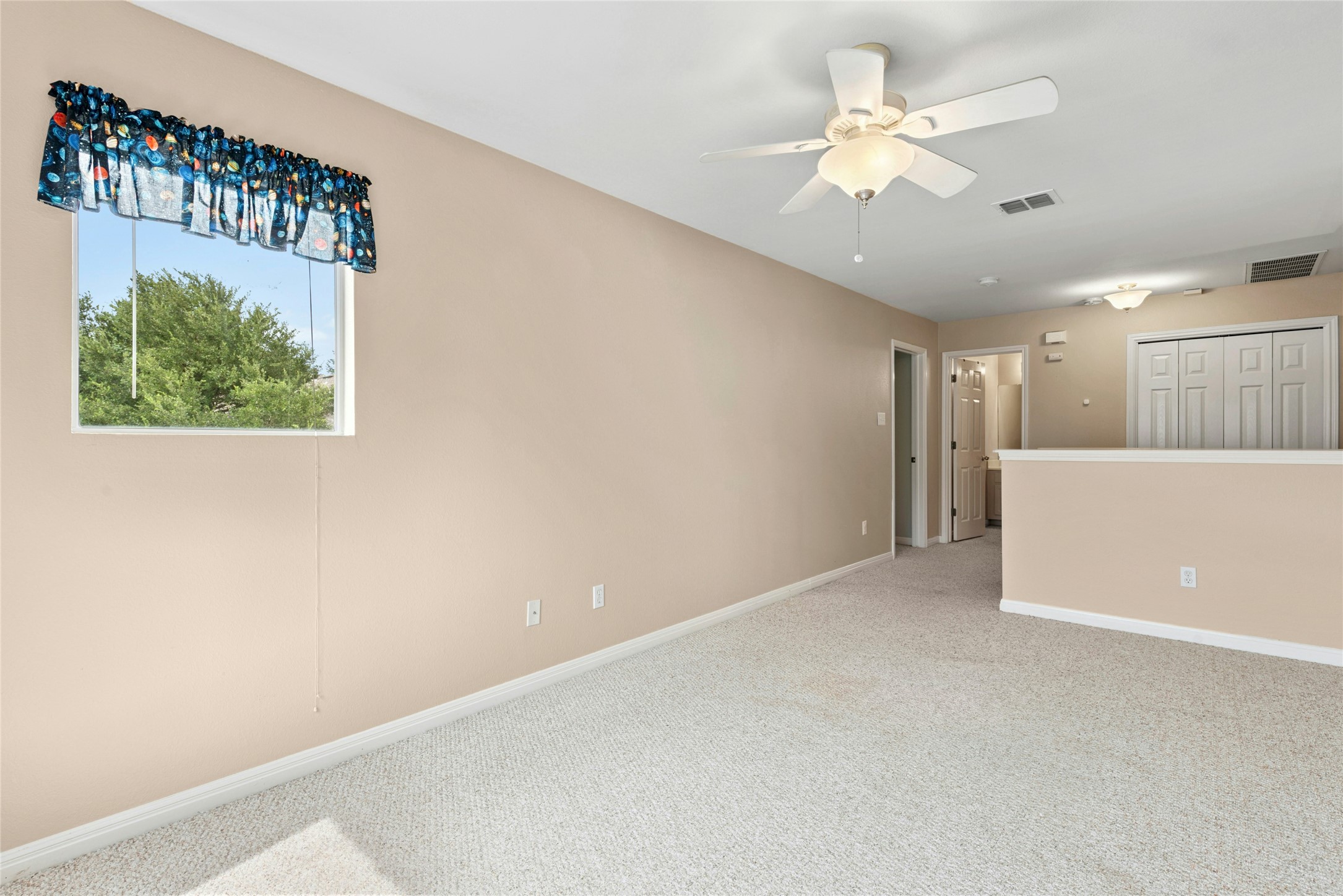7500 Shadowridge Run, Unit 34 Austin, TX 78749 - Photo 20 of 27 a view of an empty room with a window