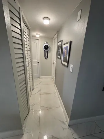 a view of a hallway with entryway