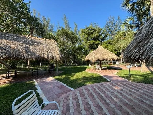 a view of a backyard with green space