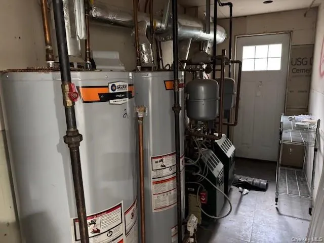 a bathroom with a toilet a sink and shower