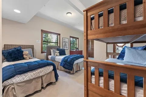 a bedroom with furniture and a window