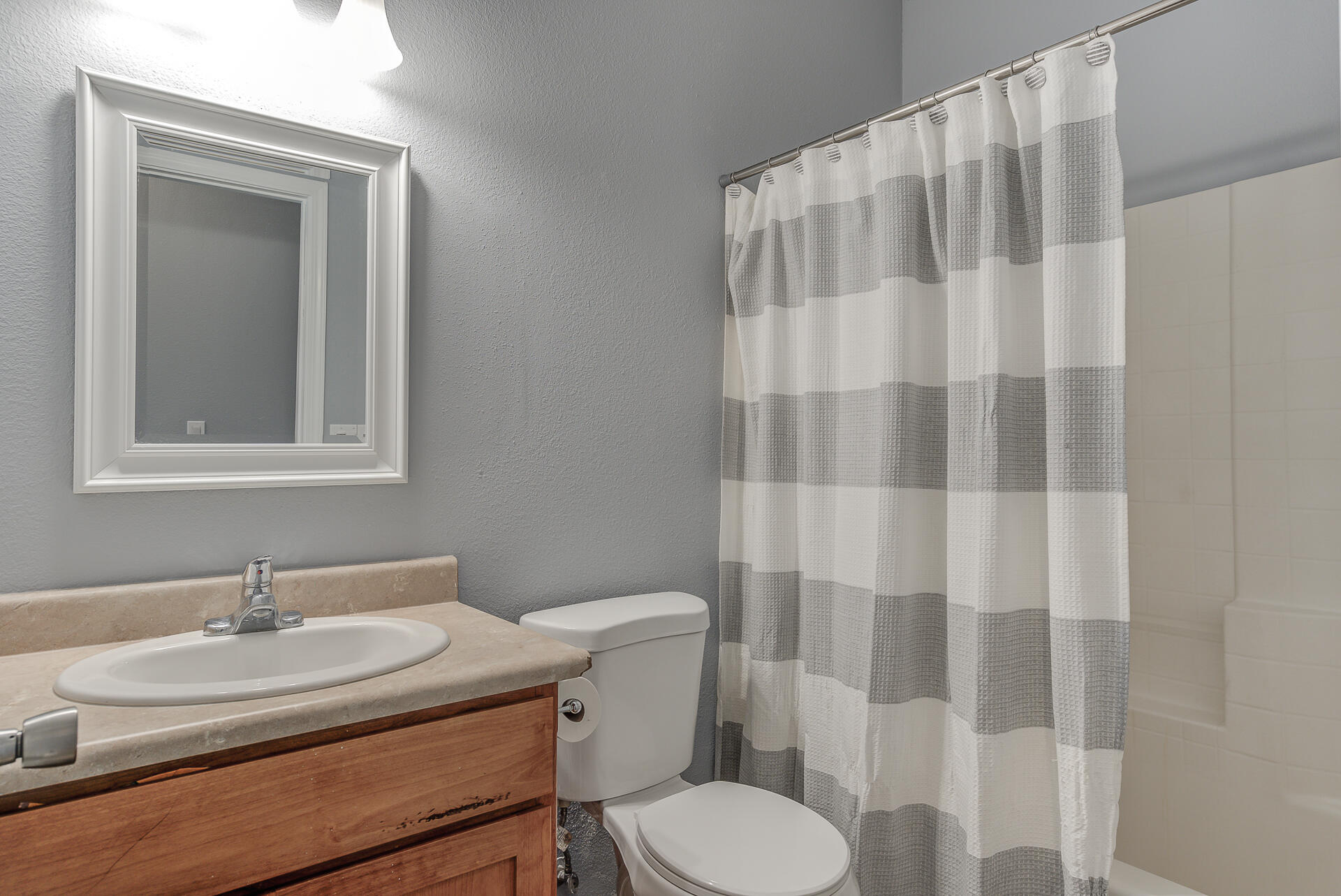 1101 Layton Road Redding, CA 96002 - Photo 15 of 37 a bathroom with a sink toilet and mirror