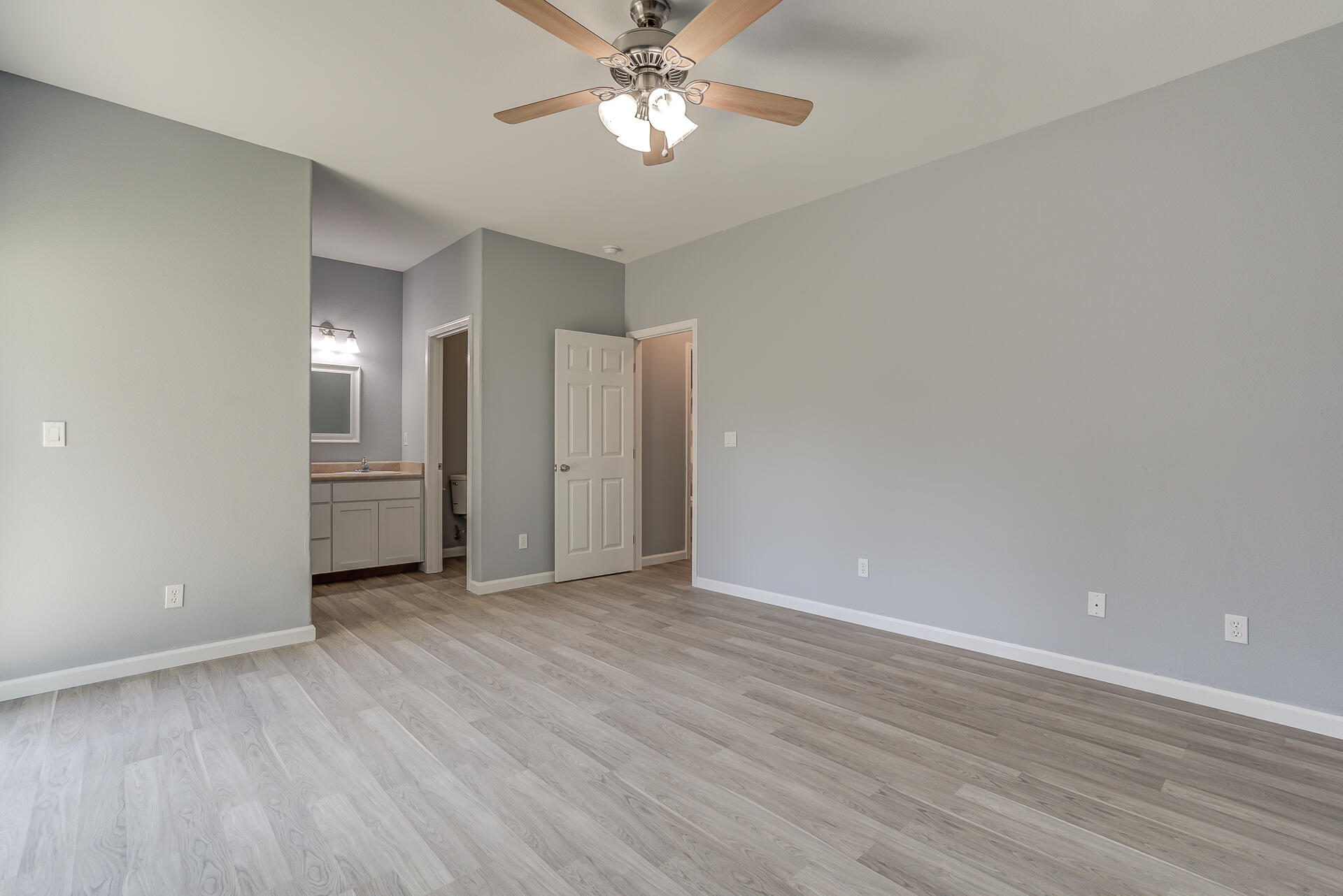 1101 Layton Road Redding, CA 96002 - Photo 19 of 37 wooden floor in an empty room with a window