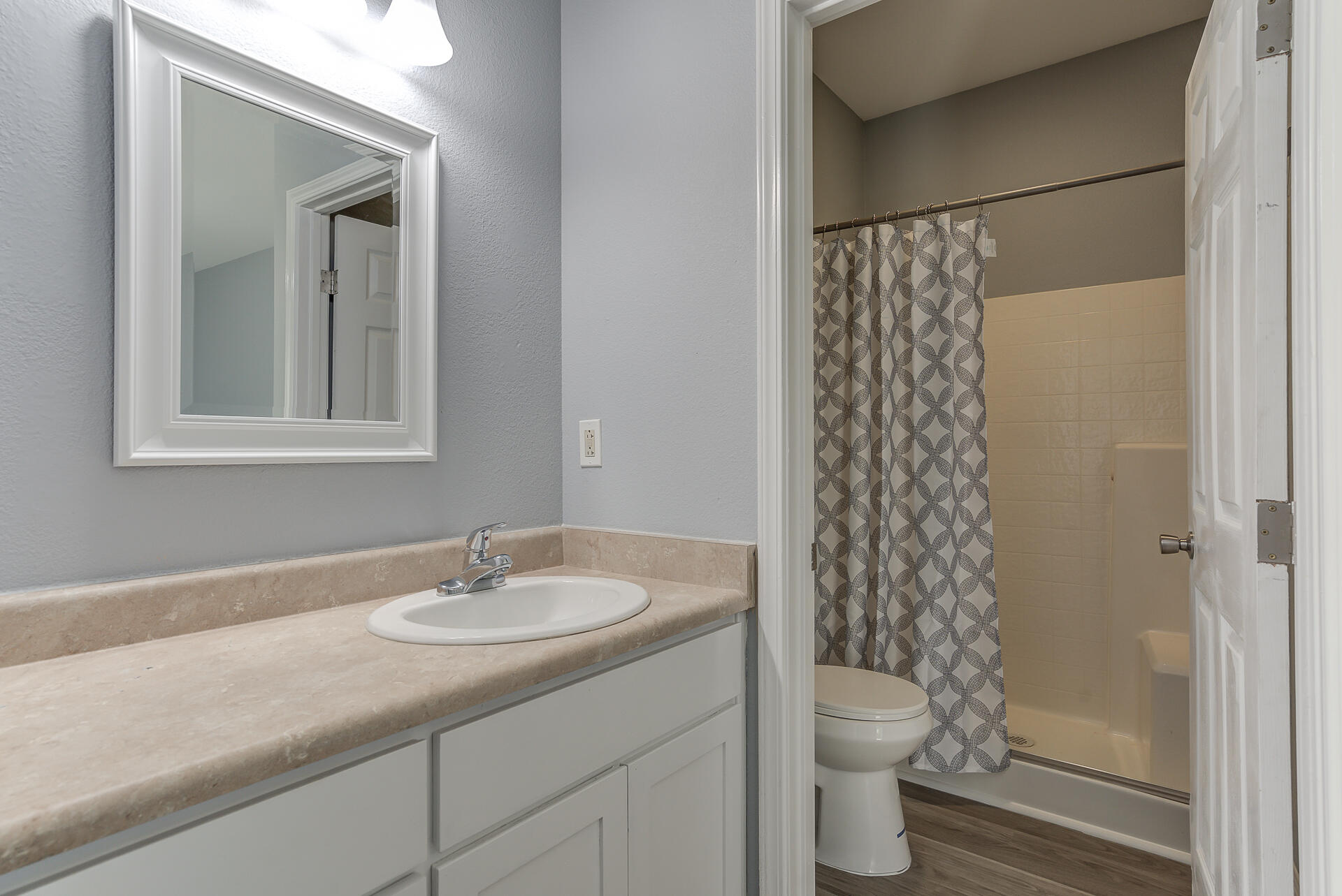 1101 Layton Road Redding, CA 96002 - Photo 21 of 37 a bathroom with a sink toilet and shower