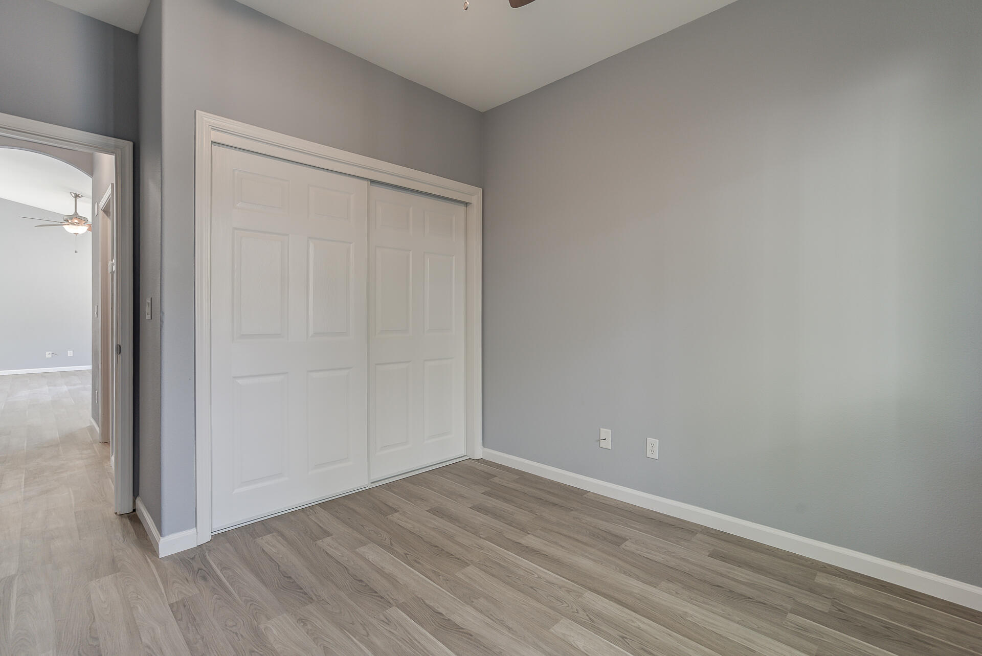 1101 Layton Road Redding, CA 96002 - Photo 25 of 37 a view of an empty room with wooden floor and closet