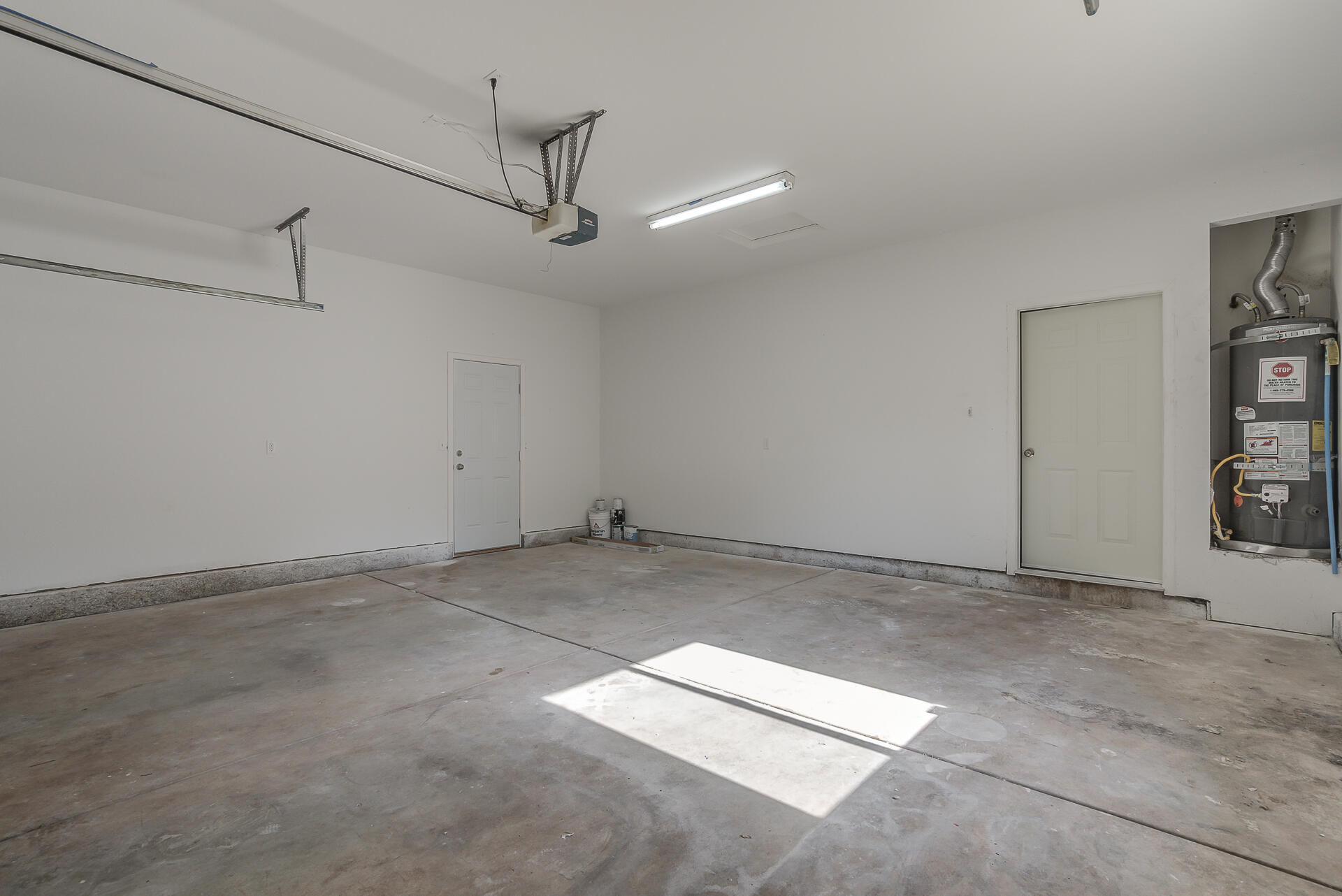 1101 Layton Road Redding, CA 96002 - Photo 29 of 37 an empty room with windows and ceiling fan