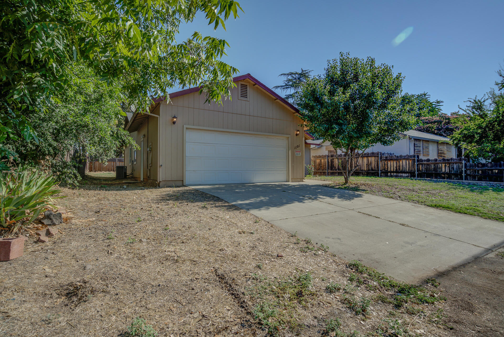 1101 Layton Road Redding, CA 96002 - Photo 35 of 37 a house with a tree in front of it