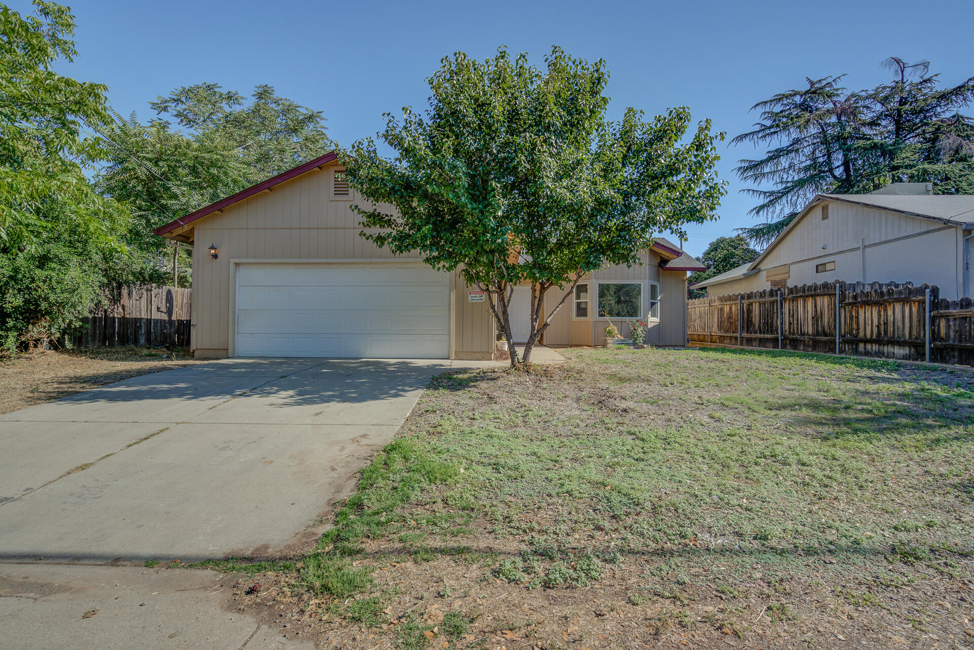 1101 Layton Road Redding, CA 96002 - Photo 36 of 37 a front view of house with yard and trees