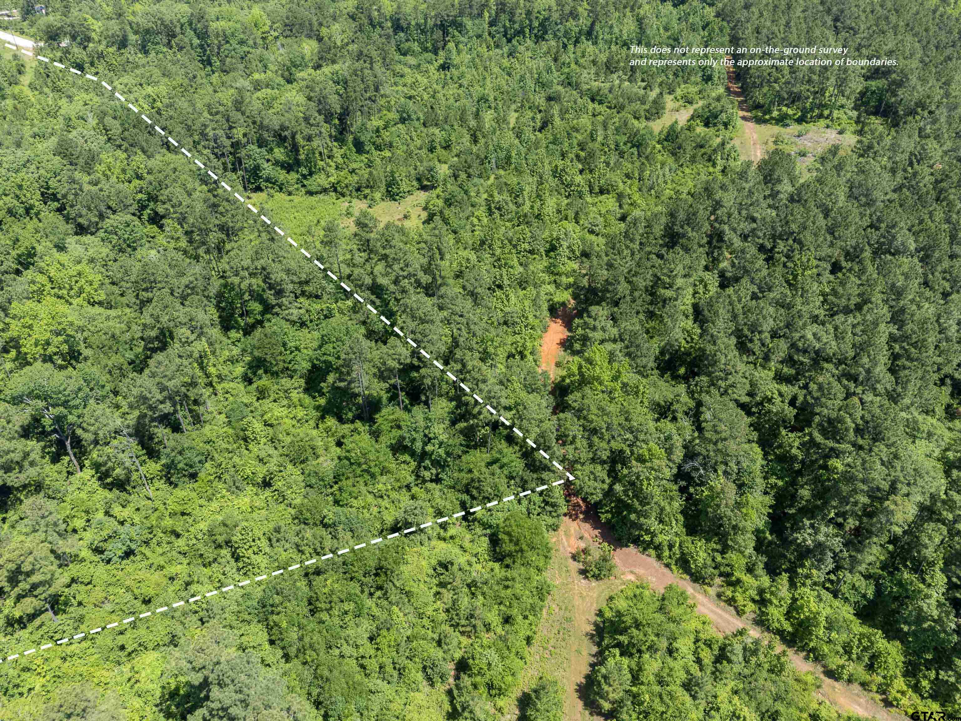 172 George Boulevard Rusk, TX 75785 - Photo 11 of 14 an aerial view of residential house with outdoor space and trees all around