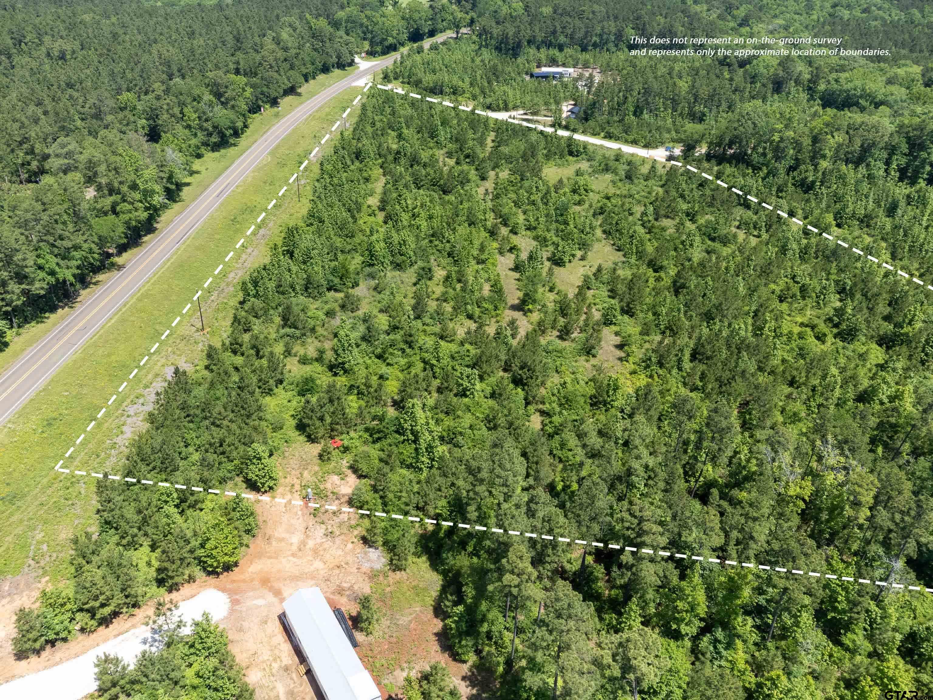 172 George Boulevard Rusk, TX 75785 - Photo 12 of 14 a view of a green yard with large trees