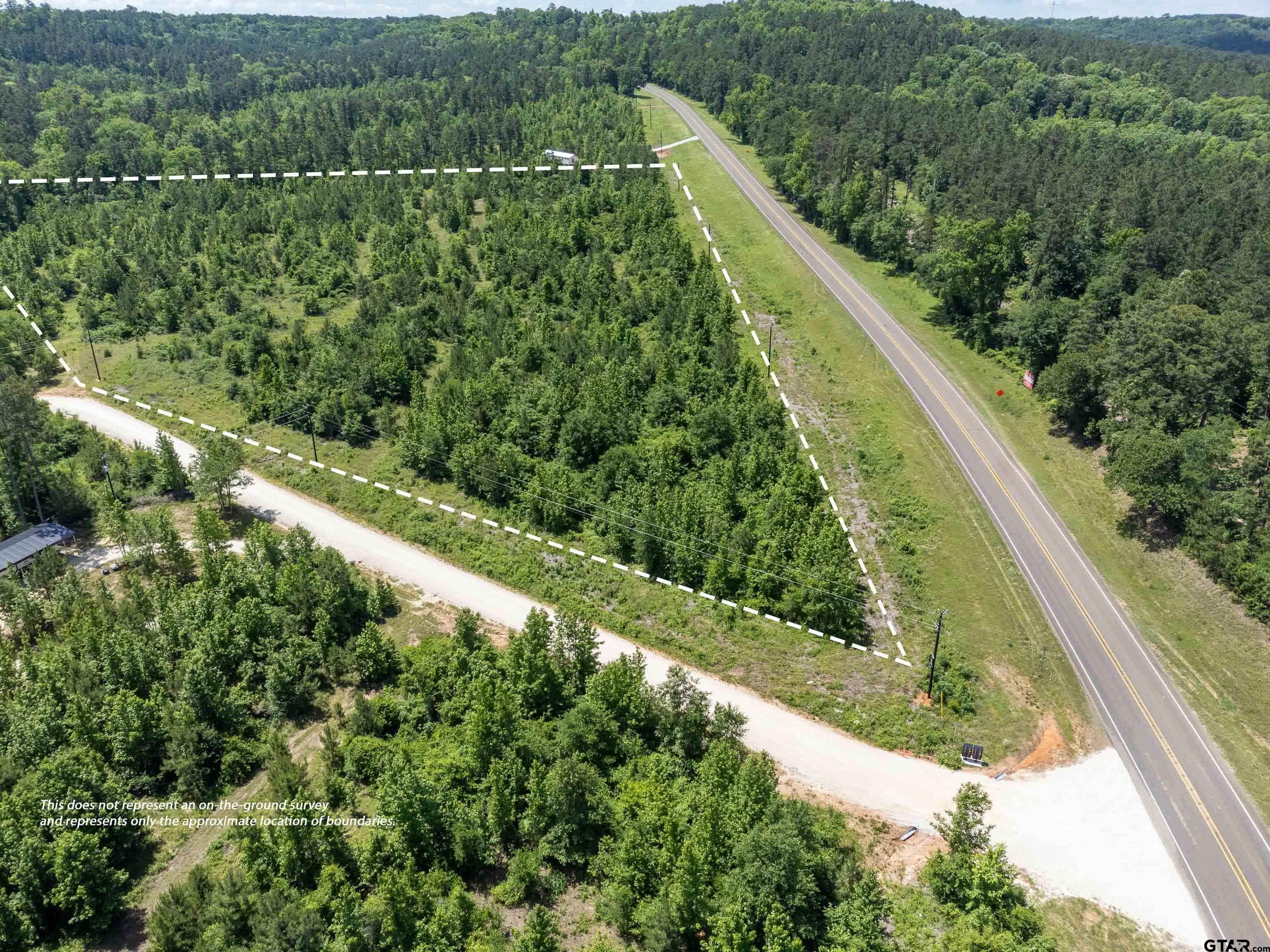 172 George Boulevard Rusk, TX 75785 - Photo 14 of 14 a view of a forest from a balcony