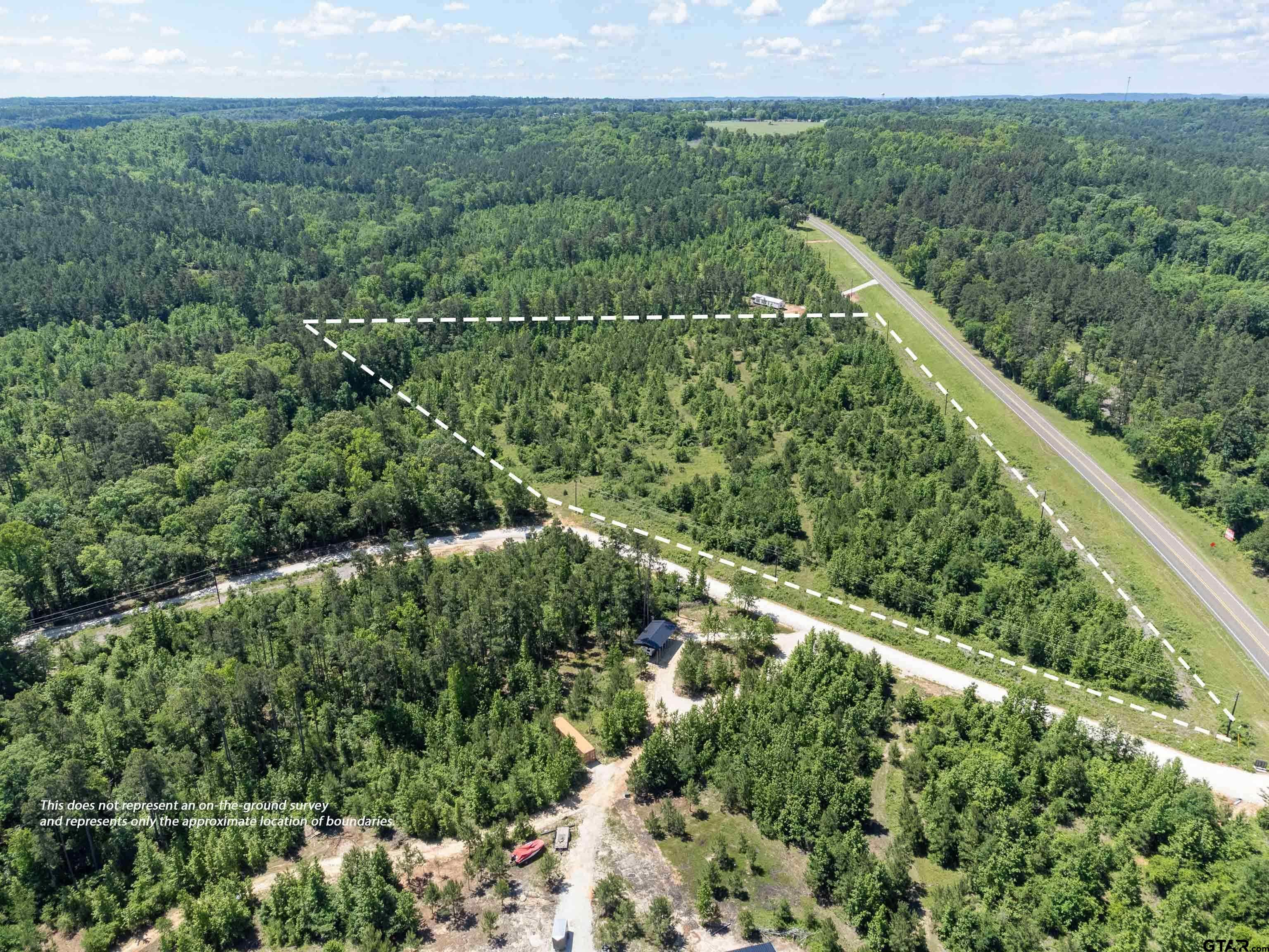 172 George Boulevard Rusk, TX 75785 - Photo 4 of 14 a view of a city with lush green forest