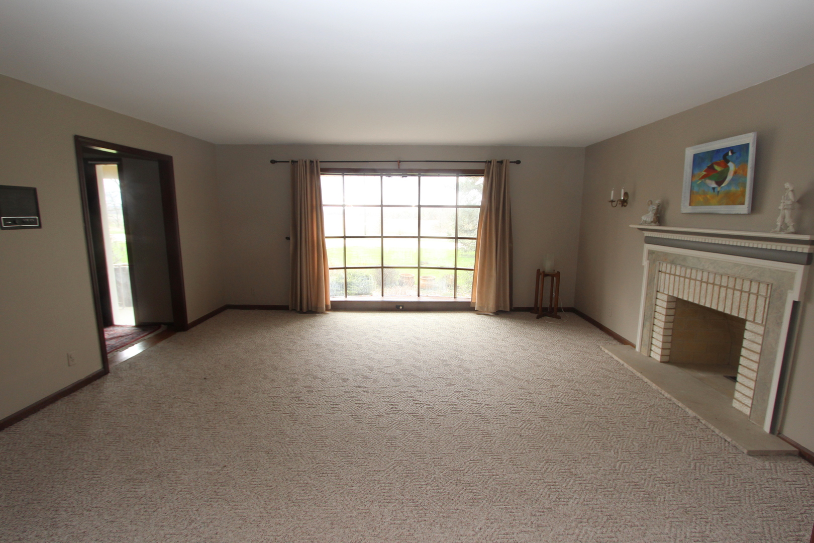 21614 River Road Marengo, IL 60152 - Photo 4 of 45 a view of empty room with a fireplace