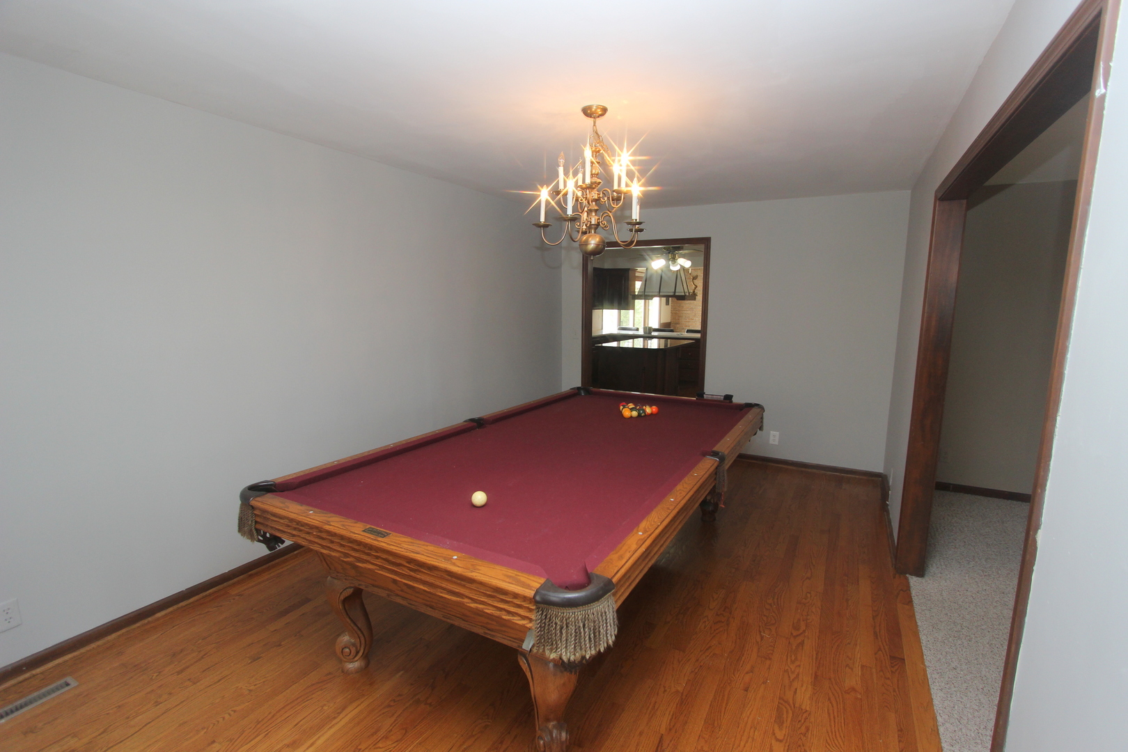 21614 River Road Marengo, IL 60152 - Photo 5 of 45 a room with pool table and windows