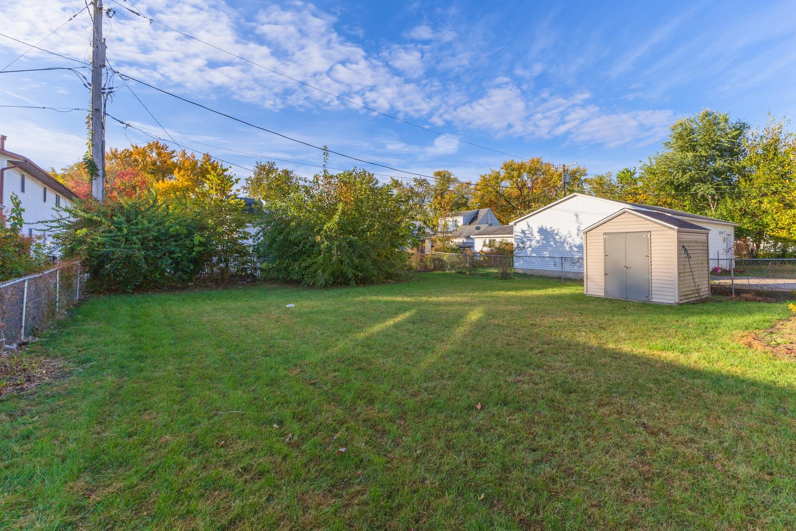 412 East Prairie Street Pontiac, IL 61764 - Photo 6 of 26 a view of a house with backyard