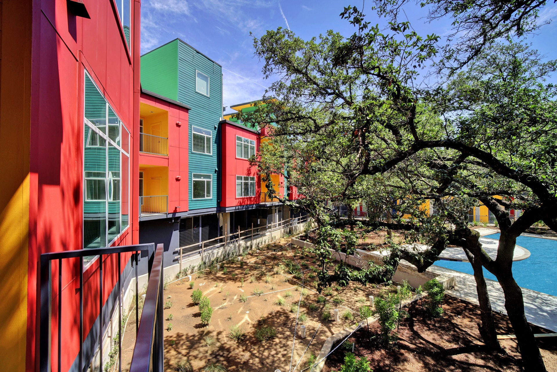 13130 Pond Springs Road, Unit 2203 Austin, TX 78729 - Photo 2 of 32 View of yard featuring a pool