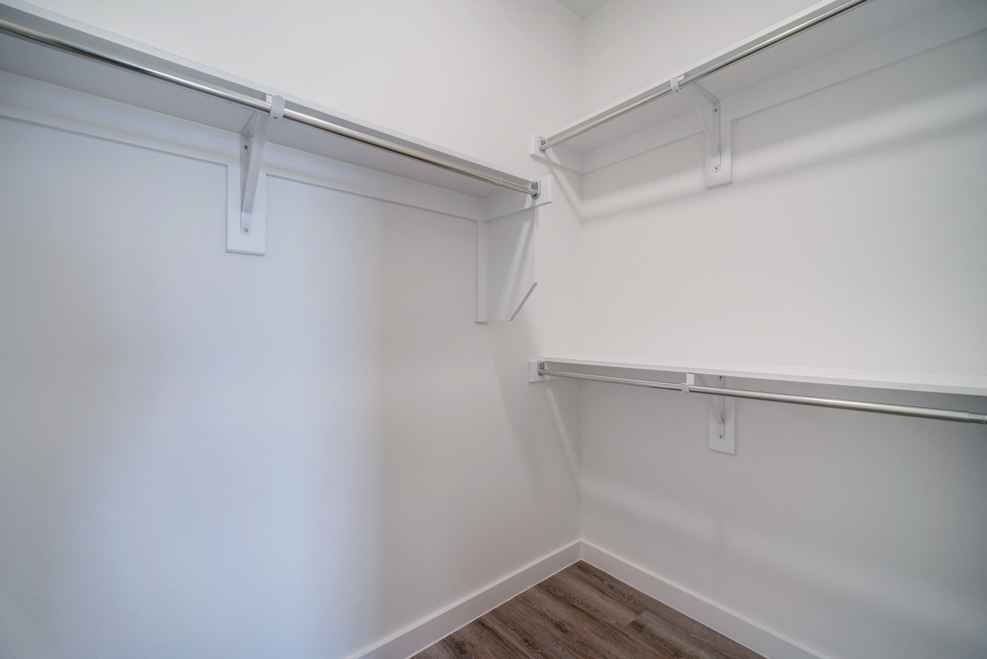 13130 Pond Springs Road, Unit 2203 Austin, TX 78729 - Photo 21 of 32 Walk in closet featuring dark wood-style floors