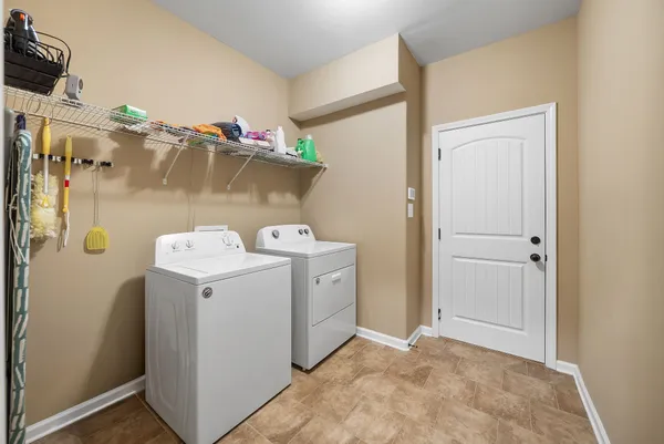 a bathroom with a sink and mirror with toilet