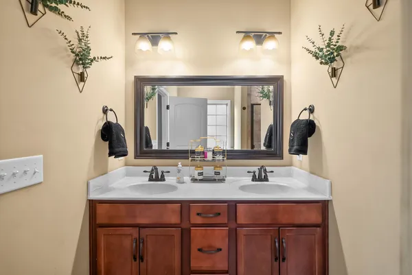 a bathroom with a bathtub and shower
