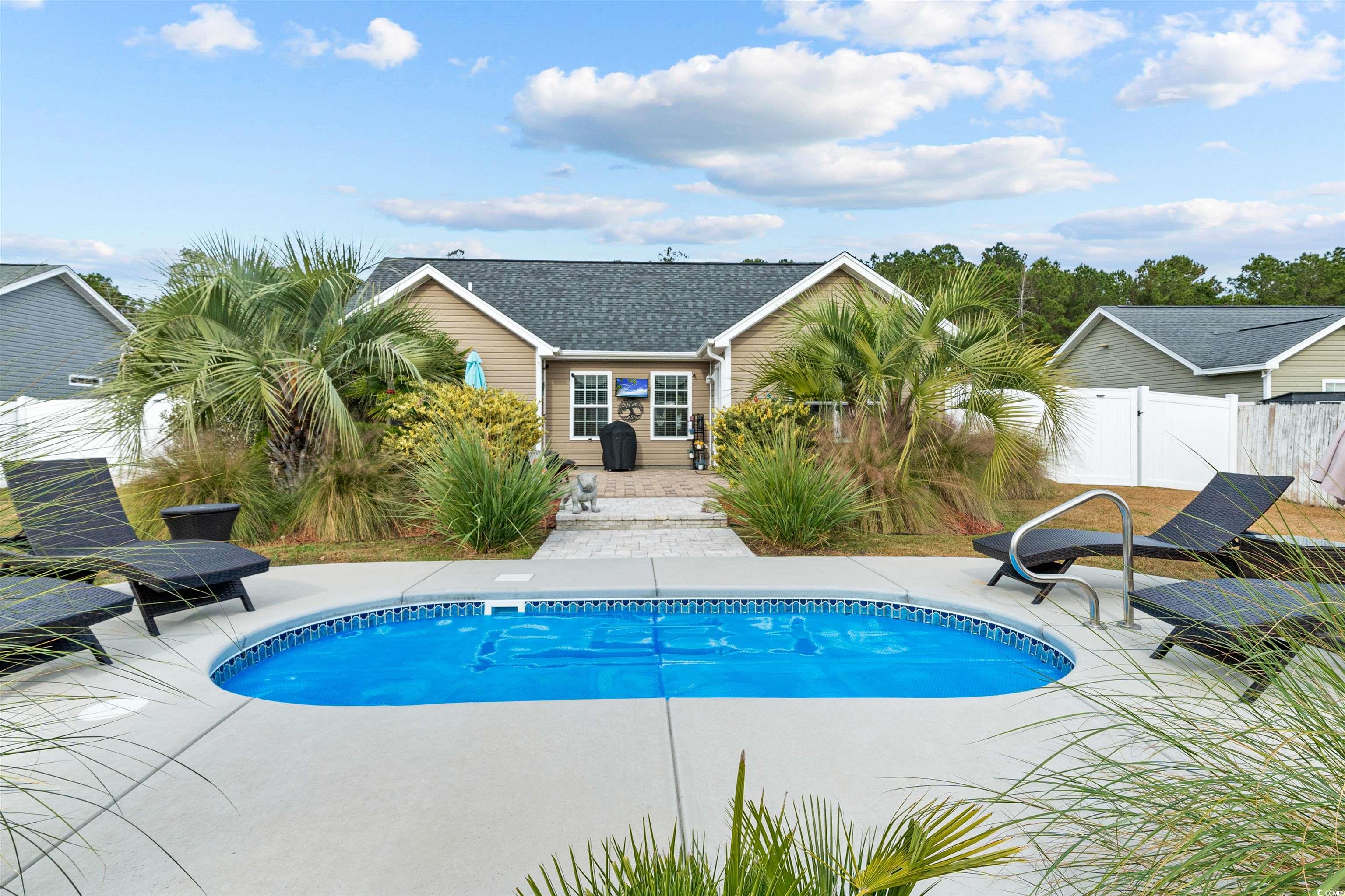 283 Beulah Circle Conway, SC 29527 - Photo 11 of 32 Outdoor pool featuring a patio area and a gate
