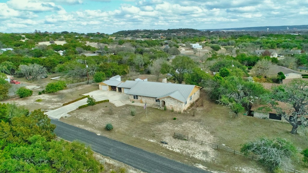 305 Rock Ridge Kerrville, TX 78028 - Photo 2 of 36 an aerial view of a house with yard