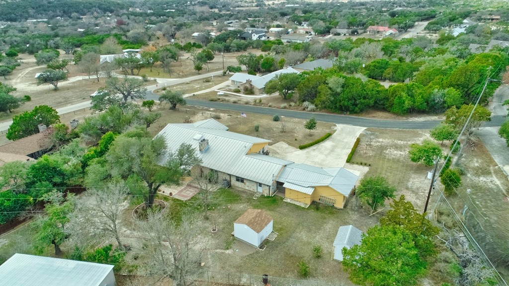 305 Rock Ridge Kerrville, TX 78028 - Photo 35 of 36 an aerial view of a house with yard swimming pool and outdoor seating