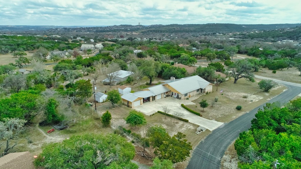 305 Rock Ridge Kerrville, TX 78028 - Photo 36 of 36 an aerial view of residential houses with outdoor space and trees