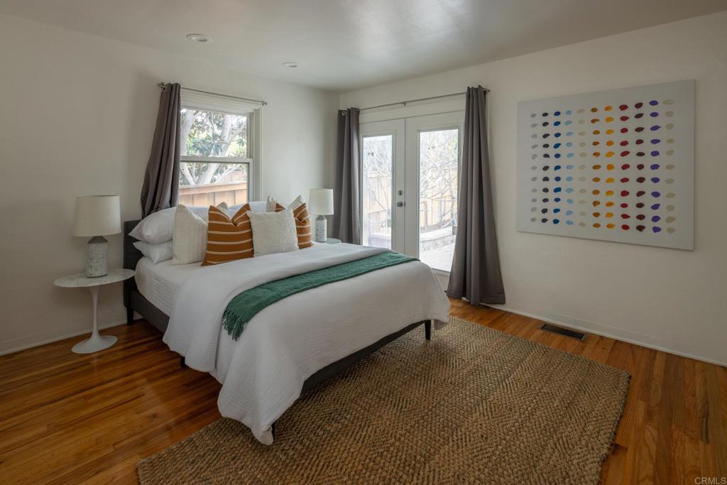 5416 Taft Avenue La Jolla, CA 92037 - Photo 13 of 23 a bedroom with a bed and a window