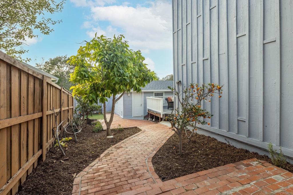 5416 Taft Avenue La Jolla, CA 92037 - Photo 21 of 23 a view of a backyard with pathway