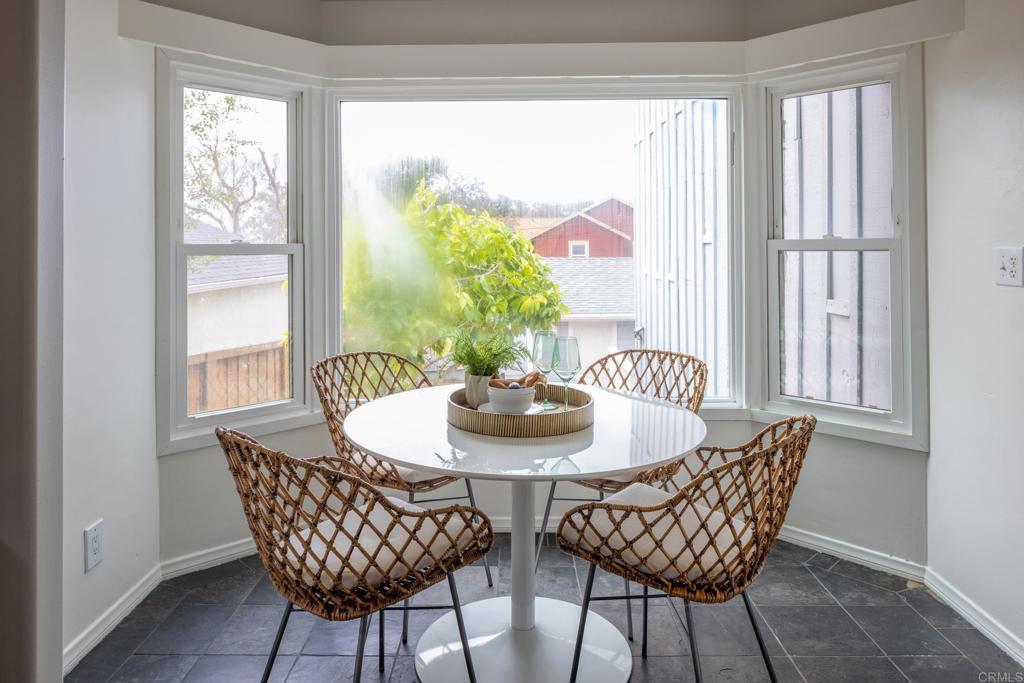 5416 Taft Avenue La Jolla, CA 92037 - Photo 7 of 23 a dining room with furniture and window