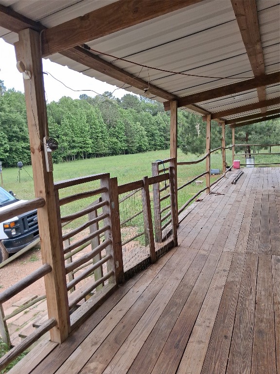 3646 Upper Leggett Road Livingston, TX 77351 - Photo 1 of 43 a view of a wooden deck with a yard
