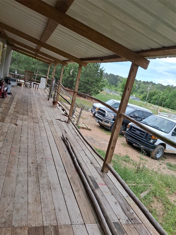 3646 Upper Leggett Road Livingston, TX 77351 - Photo 2 of 43 a view of sitting space and wooden deck