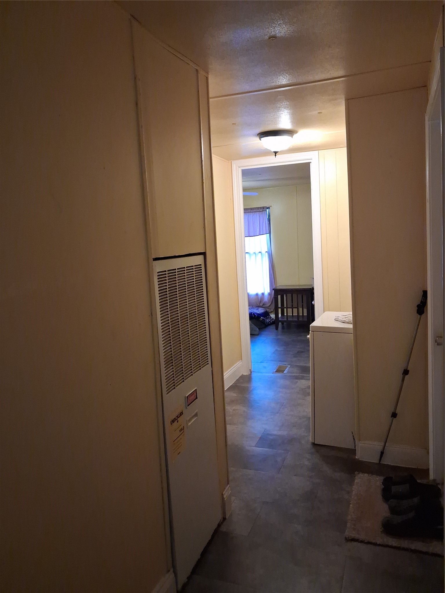 3646 Upper Leggett Road Livingston, TX 77351 - Photo 26 of 43 a view of a hallway with wooden floor and a bathroom