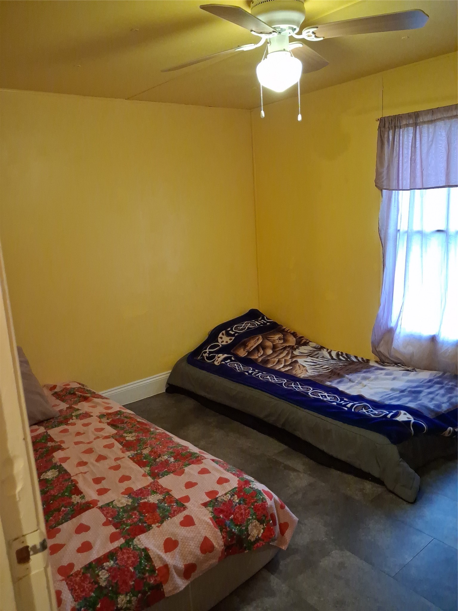 3646 Upper Leggett Road Livingston, TX 77351 - Photo 28 of 43 a bedroom with a bed and a window