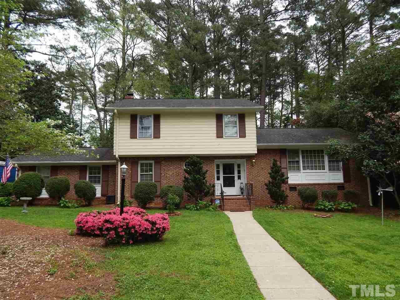 5304 Edgewood Road Raleigh, NC 27609 - Photo 1 of 25 a front view of a house with garden