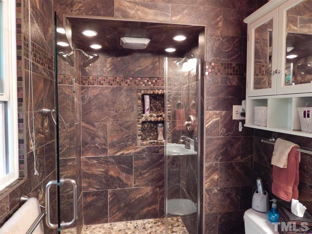 5304 Edgewood Road Raleigh, NC 27609 - Photo 11 of 25 a bathroom with a shower