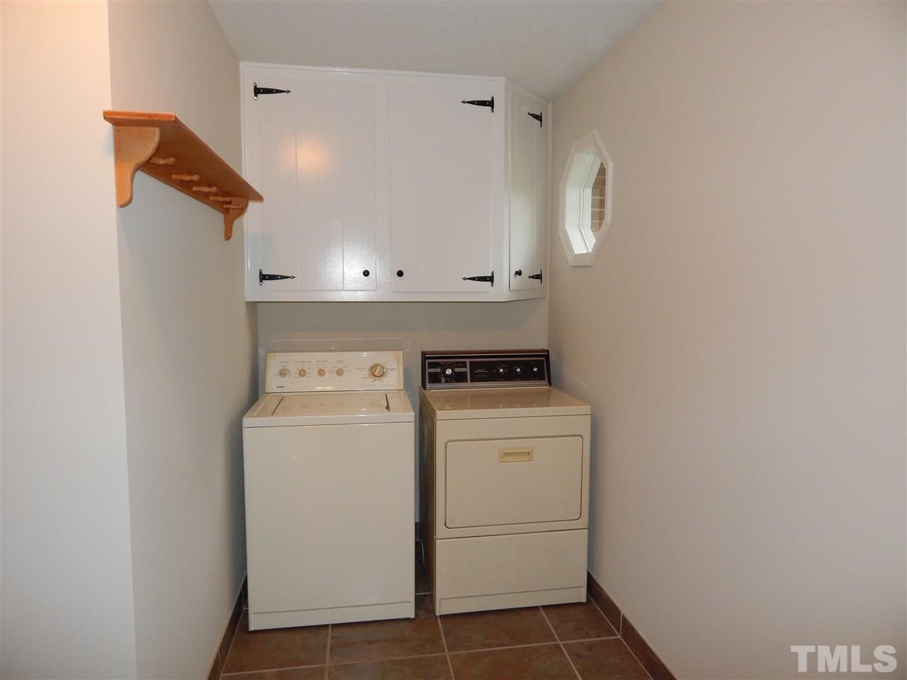5304 Edgewood Road Raleigh, NC 27609 - Photo 21 of 25 a utility room with dryer and washer
