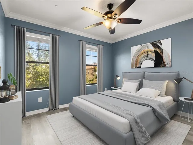 a bedroom with a large bed and a window