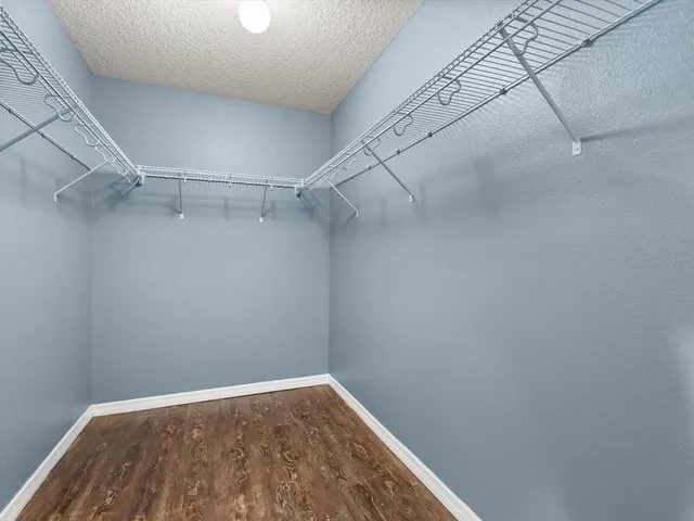 a view of a room with racks on the wall