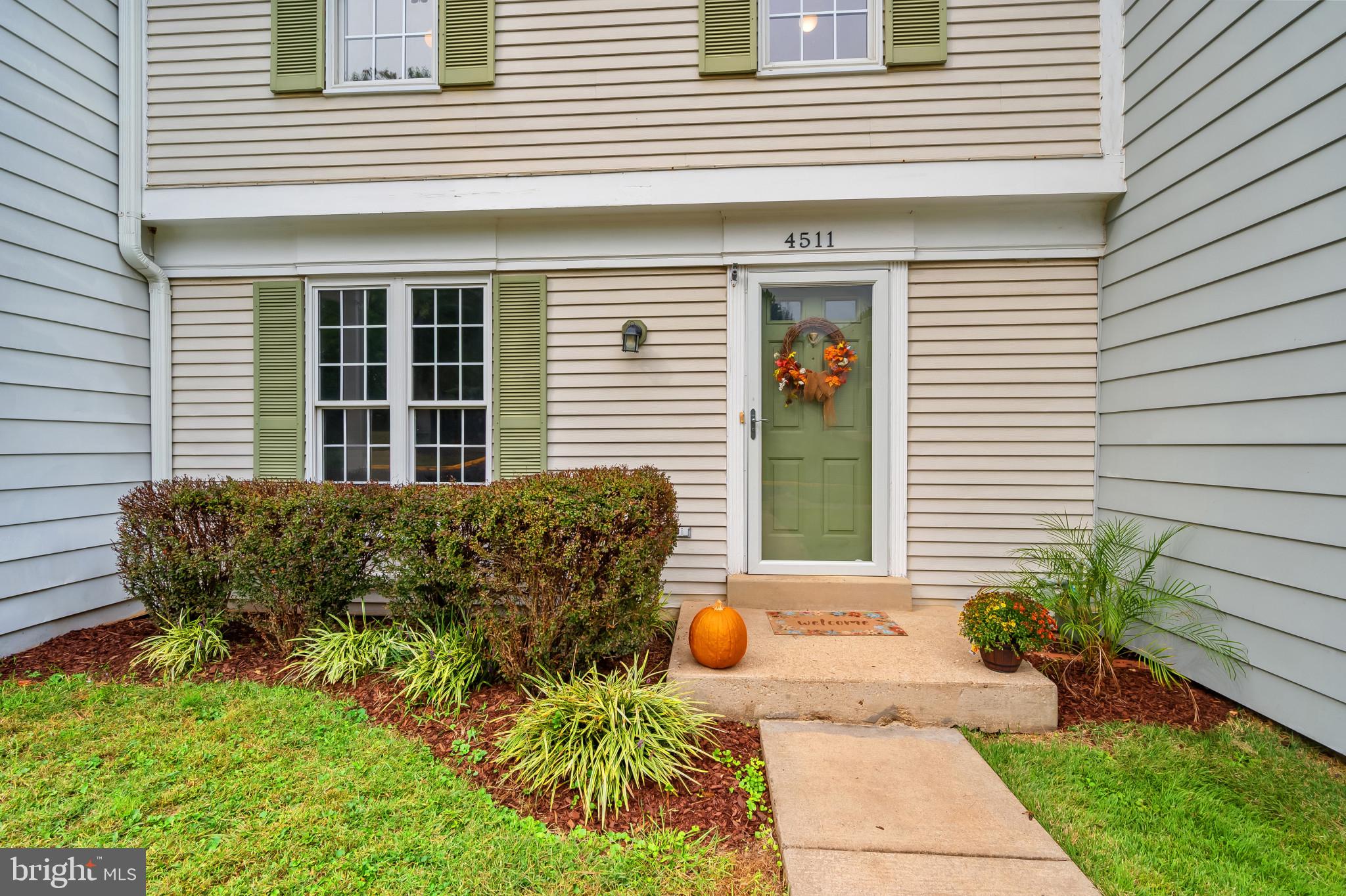 4511 Jenner Court Olney, MD 20832 - Photo 2 of 40 a front view of a house with a yard