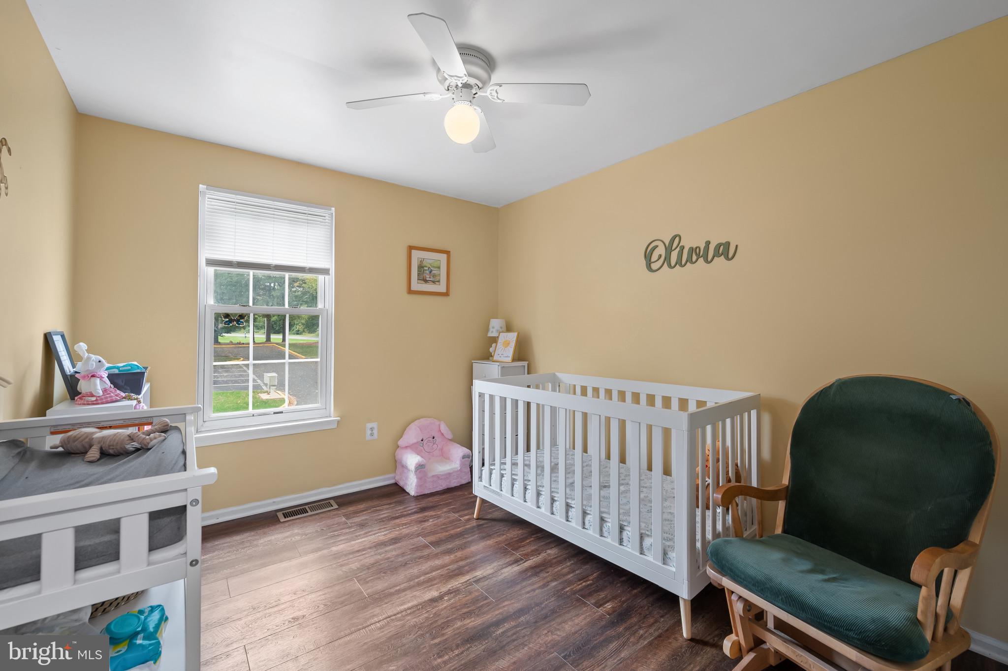 4511 Jenner Court Olney, MD 20832 - Photo 22 of 40 a bedroom with furniture and a window