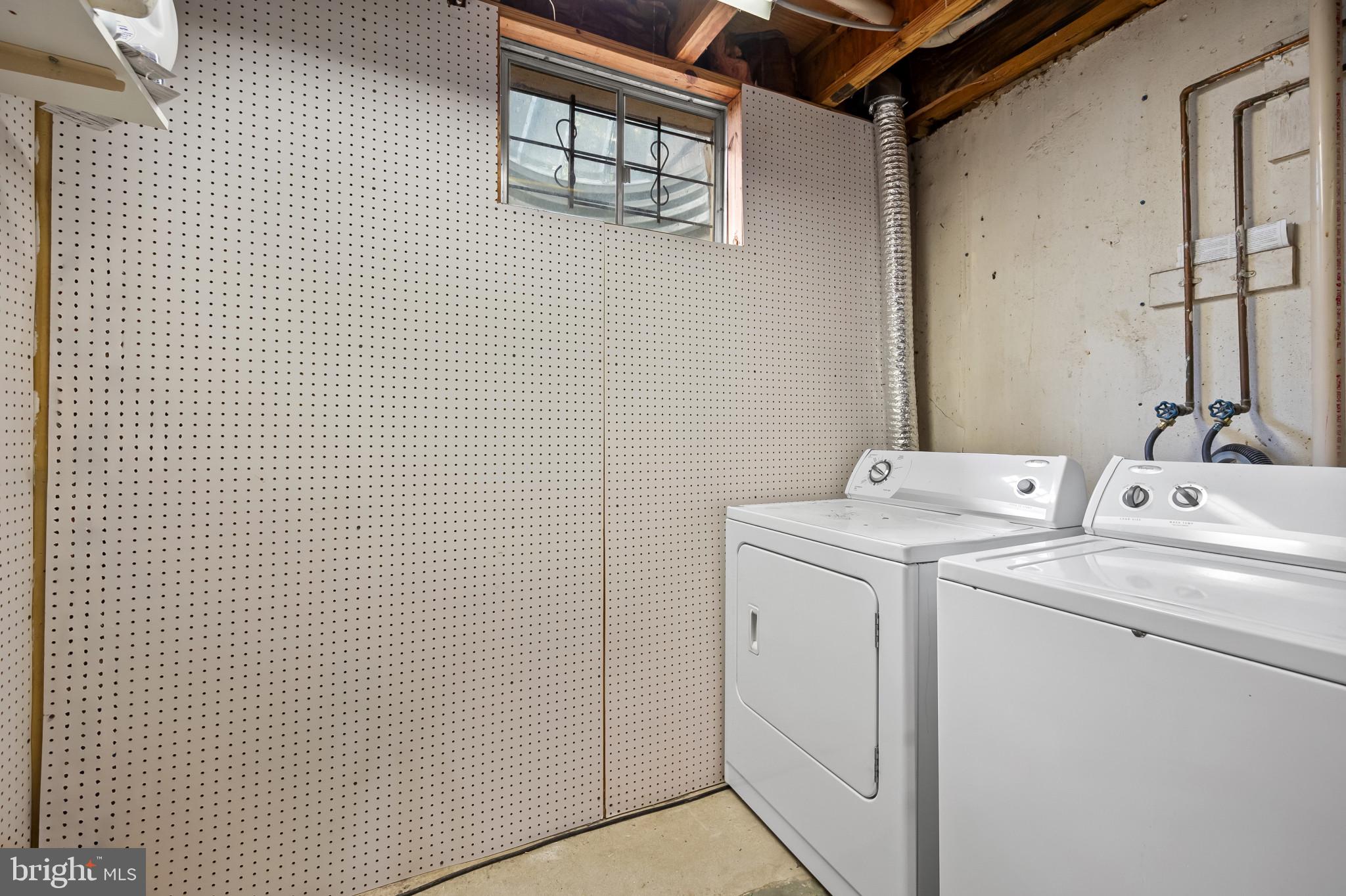 4511 Jenner Court Olney, MD 20832 - Photo 29 of 40 a utility room with dryer and washer