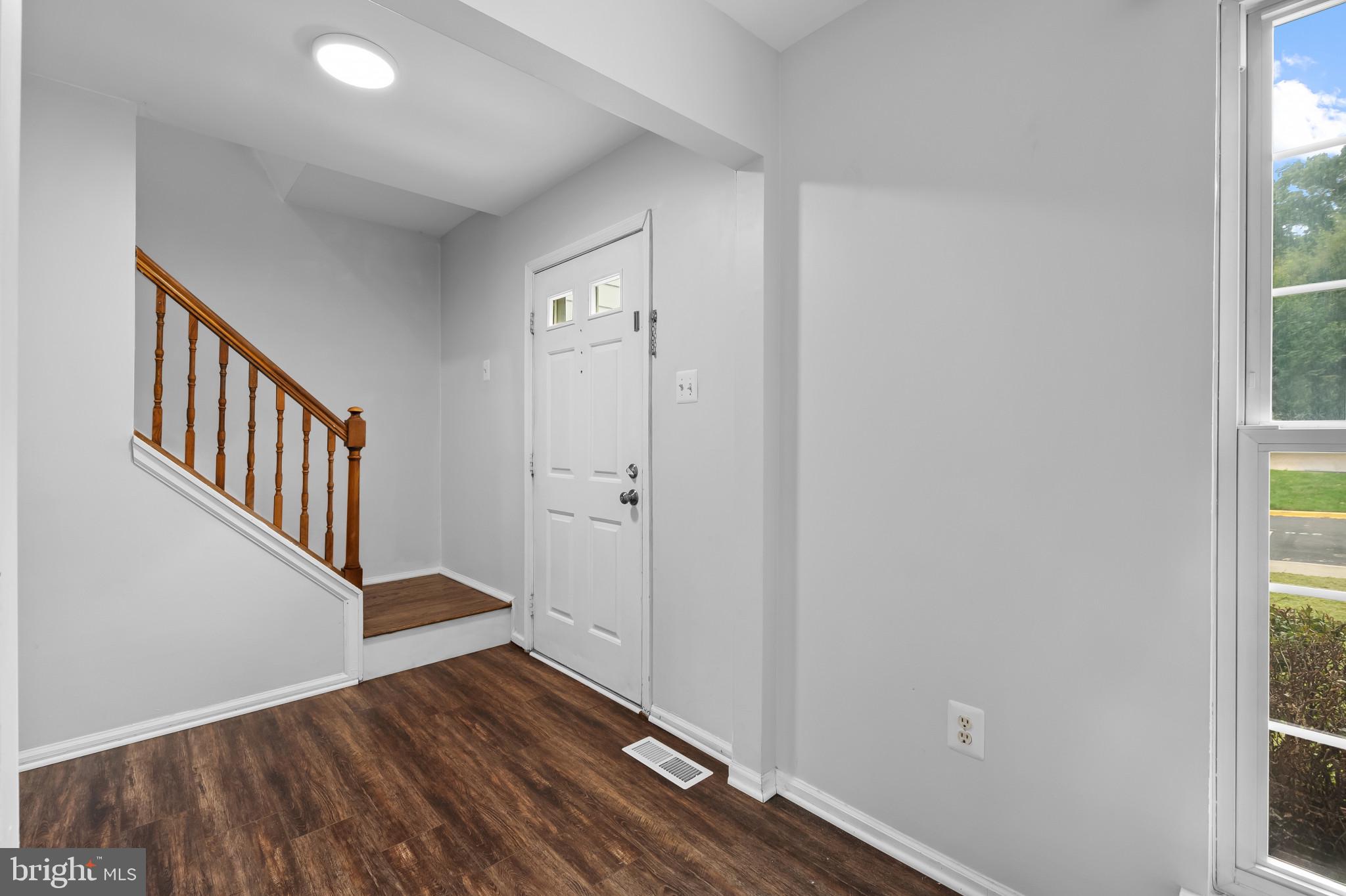 4511 Jenner Court Olney, MD 20832 - Photo 3 of 40 a view of an entryway with wooden floor