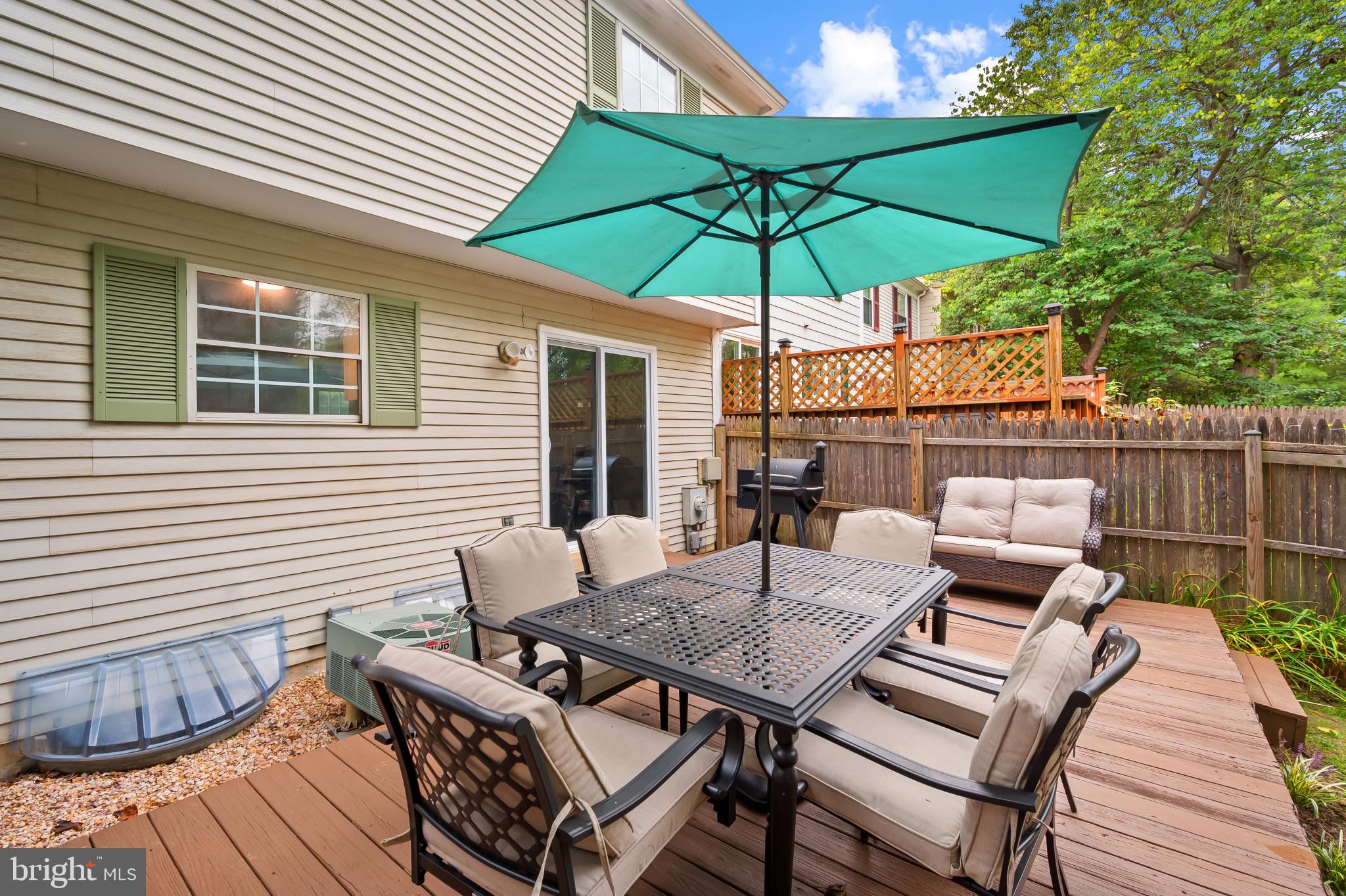4511 Jenner Court Olney, MD 20832 - Photo 34 of 40 a table and chairs in patio