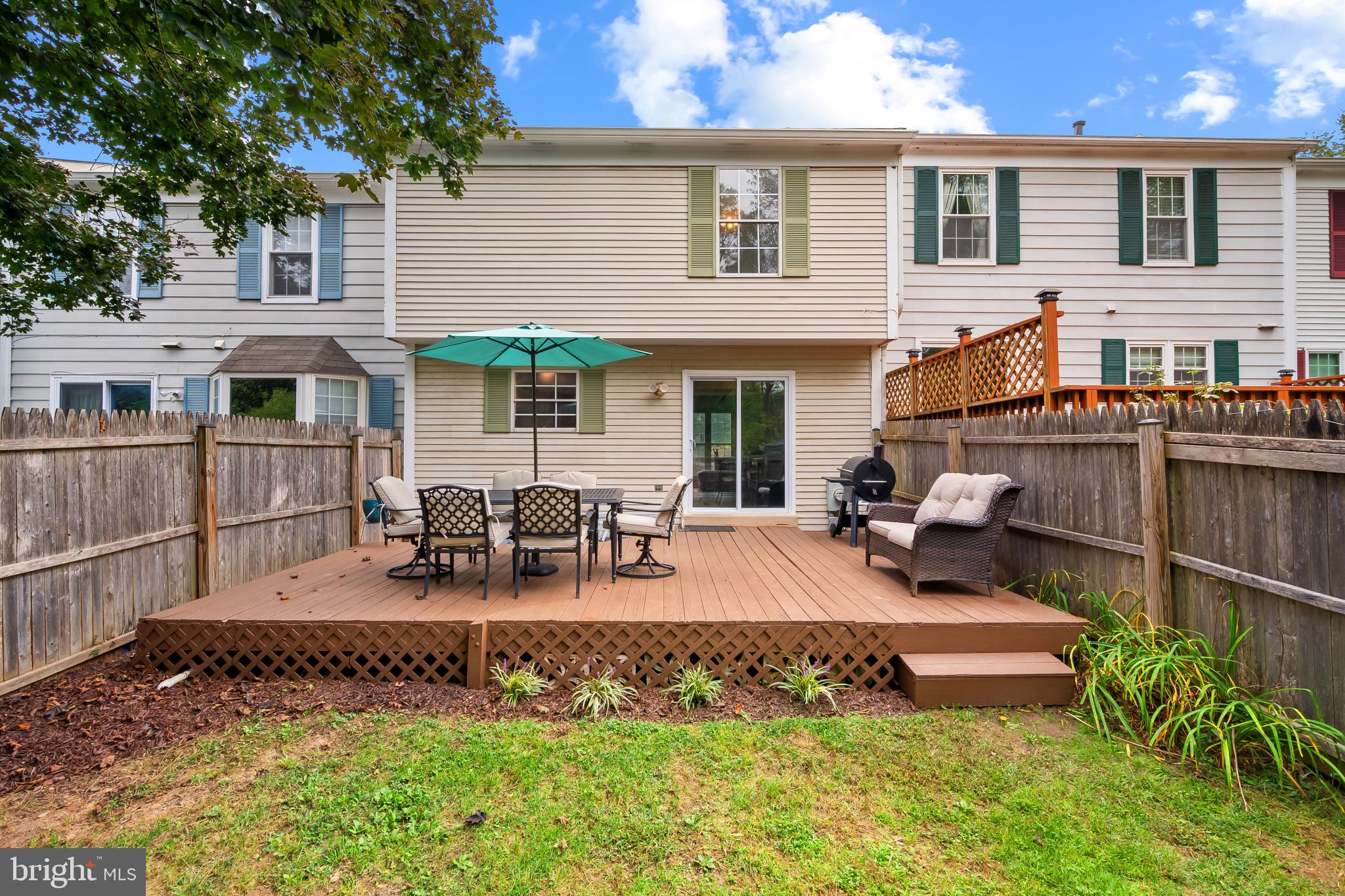 4511 Jenner Court Olney, MD 20832 - Photo 36 of 40 a view of a house with backyard and sitting area