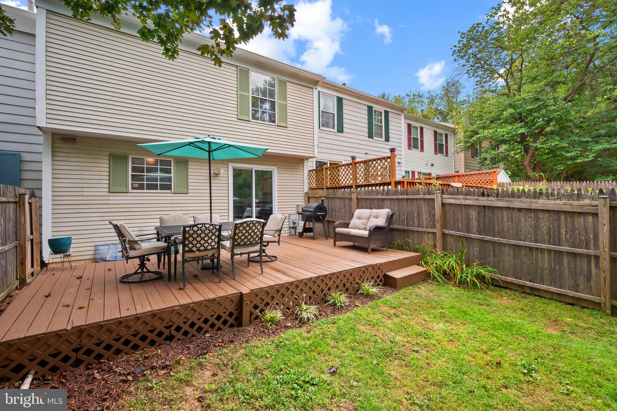 4511 Jenner Court Olney, MD 20832 - Photo 37 of 40 a view of a house with backyard and sitting area