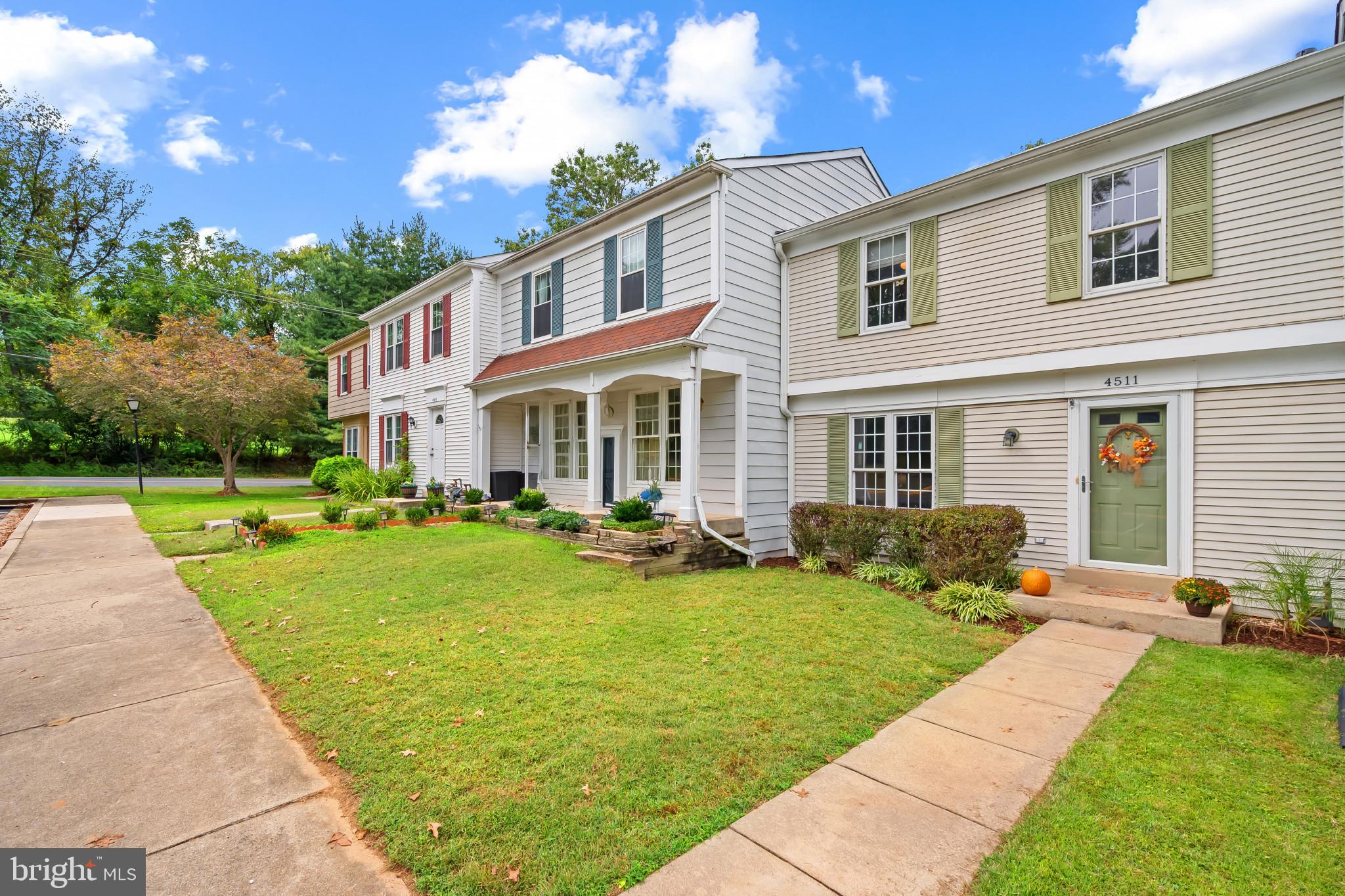 4511 Jenner Court Olney, MD 20832 - Photo 40 of 40 a front view of a house with swimming pool having outdoor seating